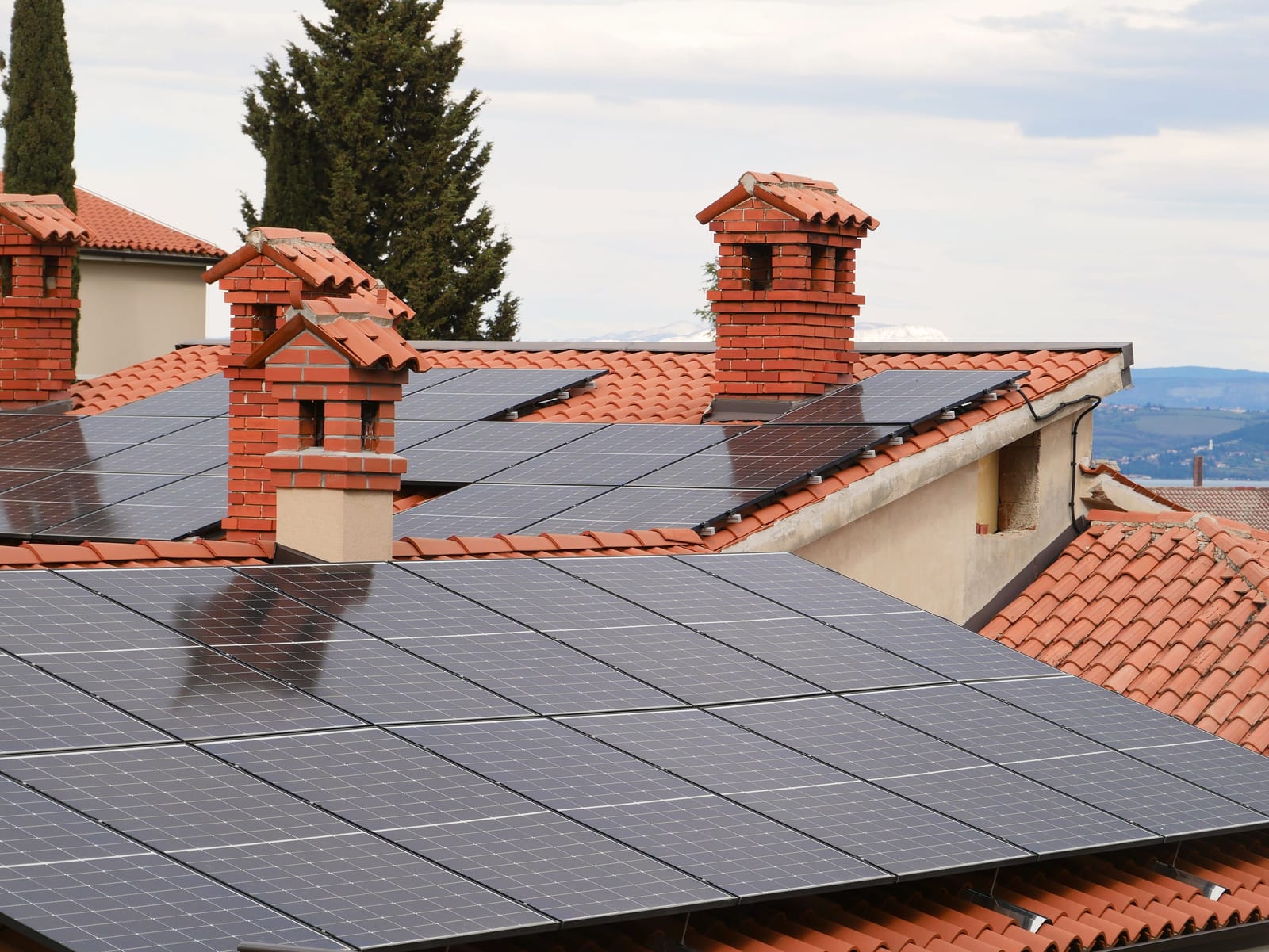 Ballasted solar mounting detail on a flat roof membrane